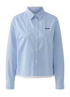 Blouse - combinaison tendance d'une longueur moderne avec un ourlet en dentelle doublé et un style classique preppy