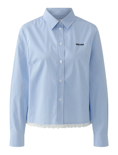 Blouse - combinaison tendance d'une longueur moderne avec un ourlet en dentelle doublé et un style classique preppy